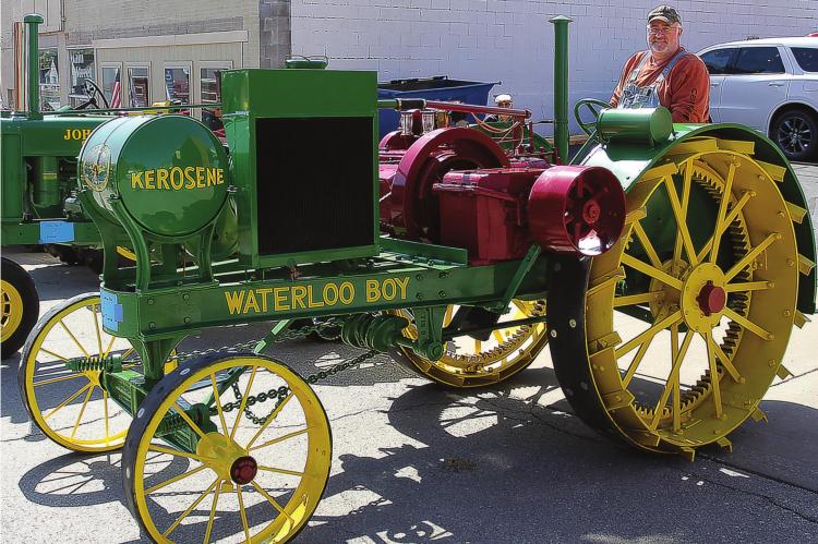 IN THE DRIVER’S SEAT, Scott Homfeld, Lexington, shows off his 1919 Waterloo Boy Model N tractor Saturday at the Richmond Mushroom Festival. J.C. VENTIMIGLIA | Staff