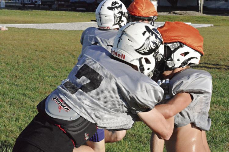 KADEN McGINNIS (No. 7) and his Norborne Hardin-Central teammates practice Monday at Hardin-Central to prep for Friday’s varsity game with Slater. SHAWN RONEY | Staff