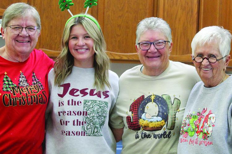 PAULA JOHNSON (from left), Sundi Swafford, Becki Crowley and Dixie Swafford prepare goodies for shoppers at the event, hosted by Rayville Christian Union Church. SHARON DONAT | Staff