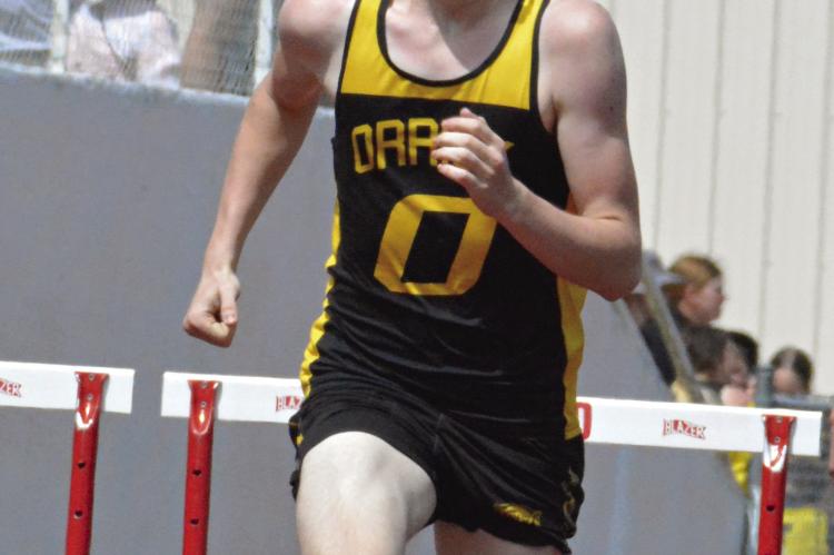 JONATHON HARRIS leads the way in the varsity boys 300-meter intermediate hurdles during the Norborne Pirate Invitational April 14 at Spartan Stadium. SHAWN RONEY | Staff