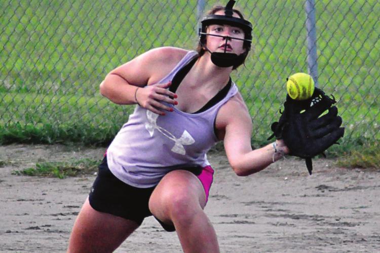 SENIOR ALYSSA RECHTERMANN snags a throw to first base during a Hardin-Central softball camp session. SHAWN RONEY | Staff