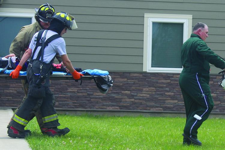A child who was possibly kicked or stepped on by a horse was transported by Lawson Fire Department to Wood Height Fire Department to await Lifelight helicopter transport to Children’s Mercy Hospital. MIRANDA JAMISON | Staff