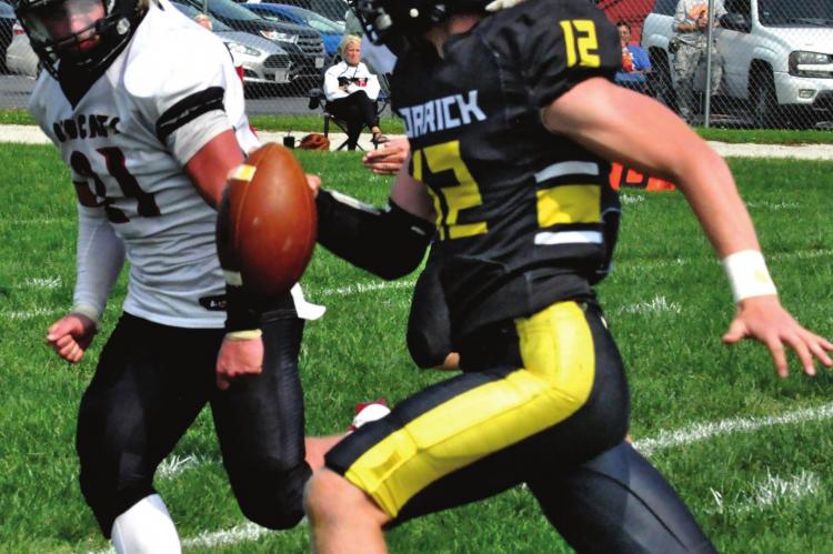 ORRICK QUARTERBACK Blake Buchanan scrambles for yards Sept. 19 against visiting Braymer/Breckenridge. SHAWN RONEY | Staff