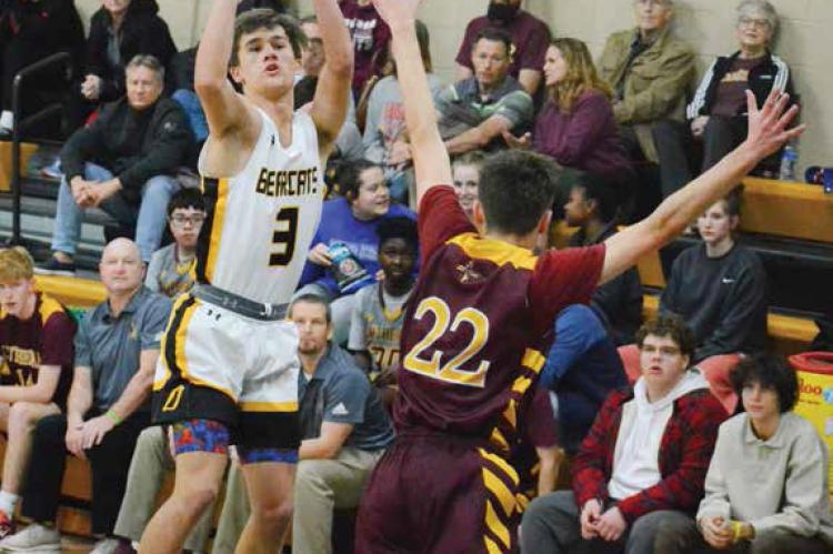 ORRICK SENIOR Zander Stevinson attempts a long-range, first-half jumper Tuesday night over the outstretched hands of Kansas City Lutheran junior Rex Lyle, as Stevinson and his fellow Bearcats return to varsity boys basketball action. Sparked by a 27-10 first quarter, the Bearcats cruise to 67-44 non-conference home victory — their first ballgame since Dec. 20, 2022. The win gives the Bearcats their fourth straight win and puts Orrick at 6-3 overall entering Friday’s non-conference road meeting with Norborne