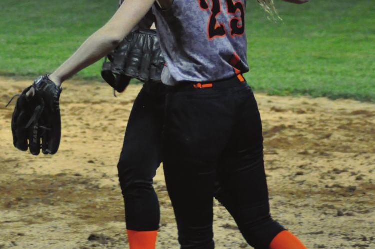JUNIOR CHELSEA GANT steps on first base for an easy unassisted ground out in the top of the fifth inning of Hardin-Central’s Class 1 District 12 Tournament meeting with Hale/Bosworth on Tuesday night at Norborne. SHAWN RONEY | Staff