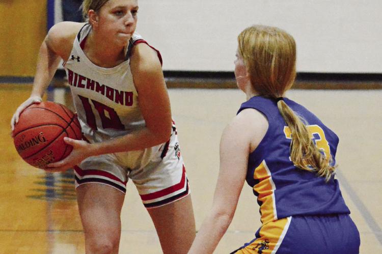 SENIOR GUARD Kaylee Pugh (left) sizes up her defender, Lafayette County first-year high schooler Addison Frerking, Dec. 8 at the Husker Classic. SHAWN RONEY | Staff