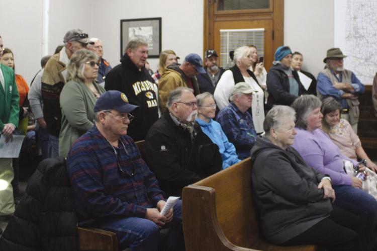 COMMUNITY MEMBERS gather to voice personal experiences with MU Extension programs and call for continued funding during public comment. MIRANDA JAMISON | Staff