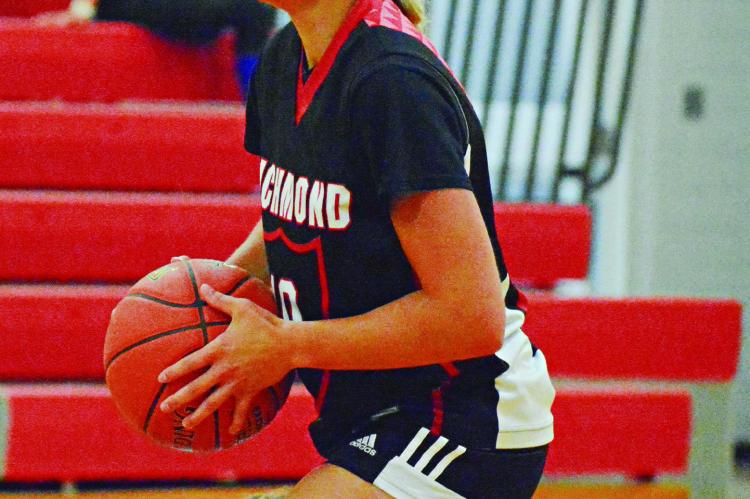 KAYLEE PUGH looks to pass Monday during Richmond’s River Valley Shootout meeting with California at Carrollton High School. SHAWN RONEY | Staff