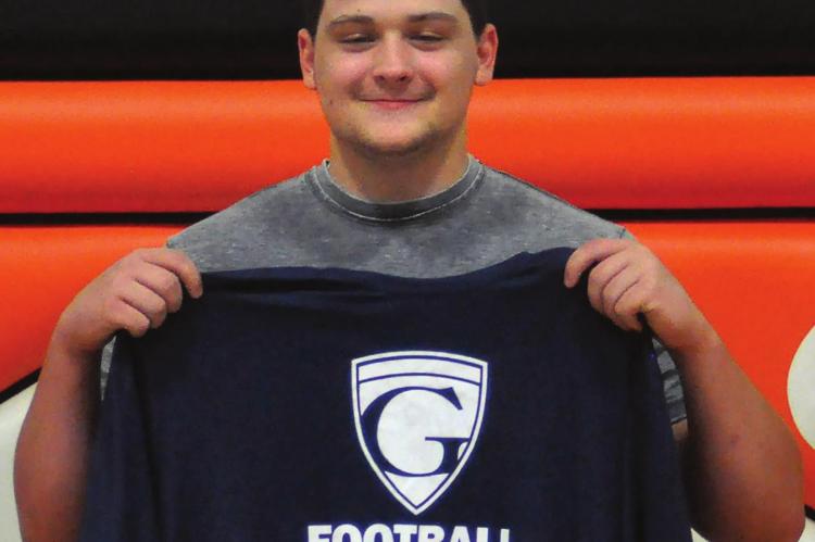 KYSOR HUGHES proudly displays his Graceland University T-shirt. SHAWN RONEY | Staff