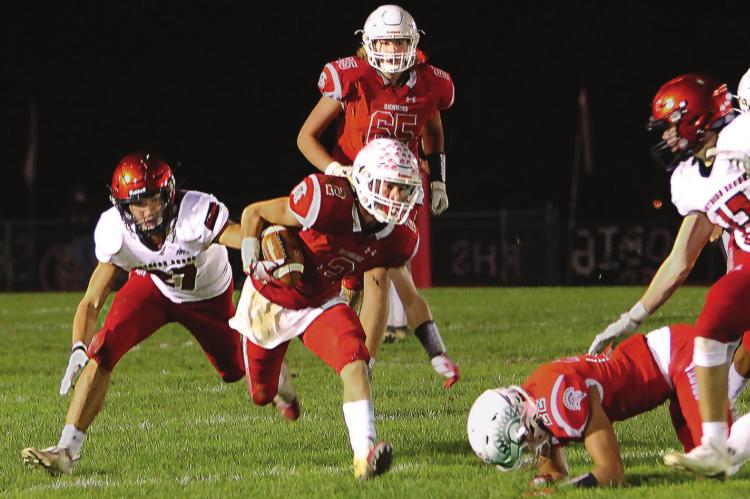 JUNIOR WIDE RECEIVER Layne Cavanah finds an opening on a 9-yard reception against Southern Boone County. J.C. VENTIMIGLIA | Staff