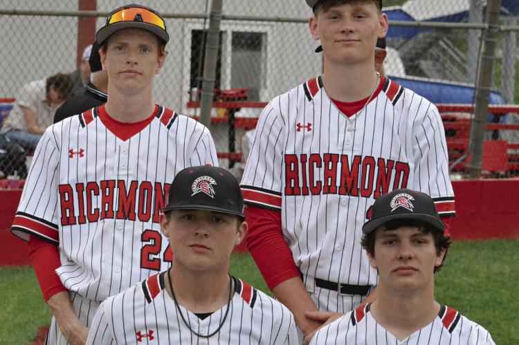 THE FOUR SENIORS on Richmond’s varsity baseball team appear together after the Spartans’ 10-0 Senior Night pasting of Lexington. Shown are Cassidy Bartron (from left) Logan Watts, Bryer Farnan and Will Robinson. SHAWN RONEY | Staff