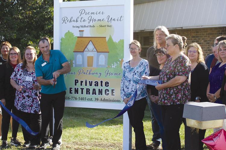 RICHMOND AREA CHAMBER of Commerce members and Rehab to Home employees cut the ribbon in celebration of the new unit at Shirkey Nursing and Rehab. SHARON DONAT | Staff