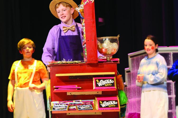 JACKSON CROWLEY (center) embraces his role as Candyman. SHARON DONAT | Staff