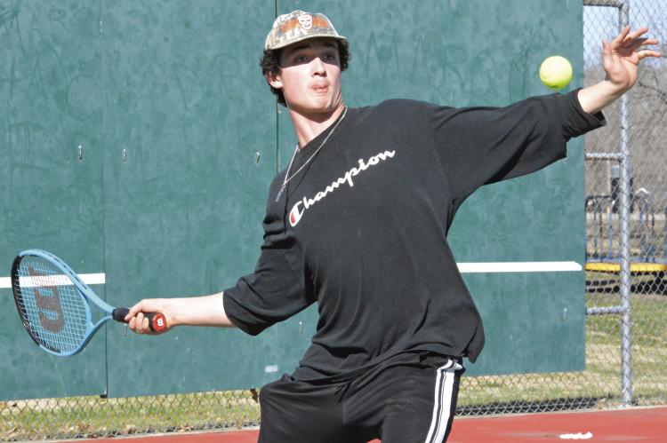JAZSPHER ULLEBERG, a Richmond junior, sets up for a forehand shot.