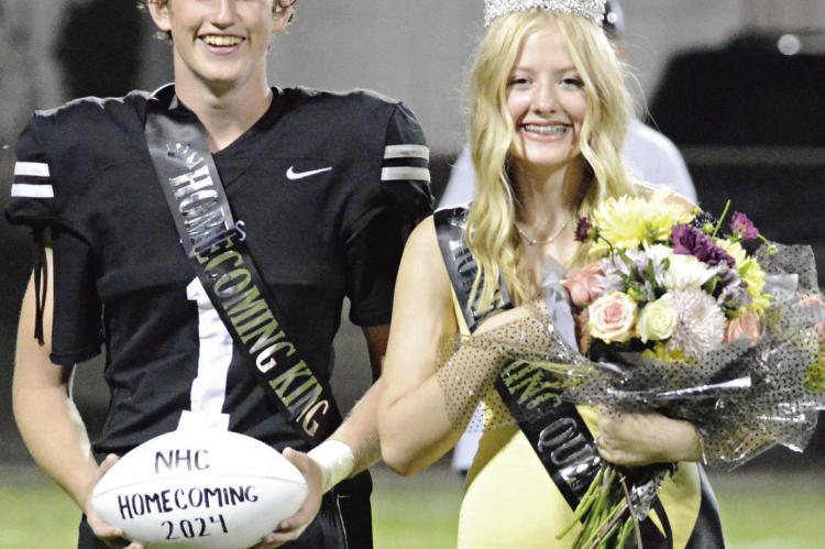 KALEL BOWMAN (left) and Emily Barrett are crowned Hardin-Central Homecoming King and Queen after Norborne Hardin-Central’s 46-20 victory over Orrick at Hardin-Central. Norborne also crowns its king and queen during recent coronation ceremonies. SHAWN RONEY | Staff