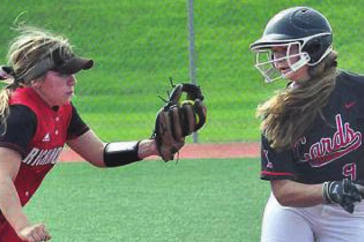 NATALEE WEBER, seen here pursuing a baserunner during a 2019 preseason jamboree at Excelsior Springs, is taking her game to the NCAA Division II level. SHAWN RONEY | Staff