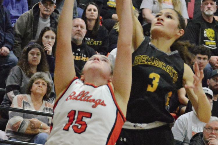ADDISON SCHACHTELE of Hardin-Central (left) and Anela Fletcher of Orrick are among the area athletes who’ve been sidelined to start this week because of the latest cold snap. SHAWN RONEY | Staff