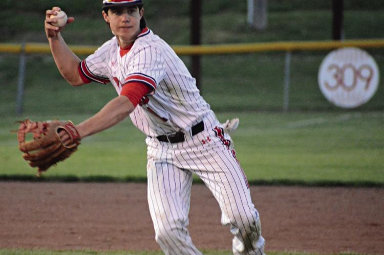 JOSH PYLE looks to see if he has a play after fielding a grounder Monday at Southview Park. SHAWN RONEY | Staff