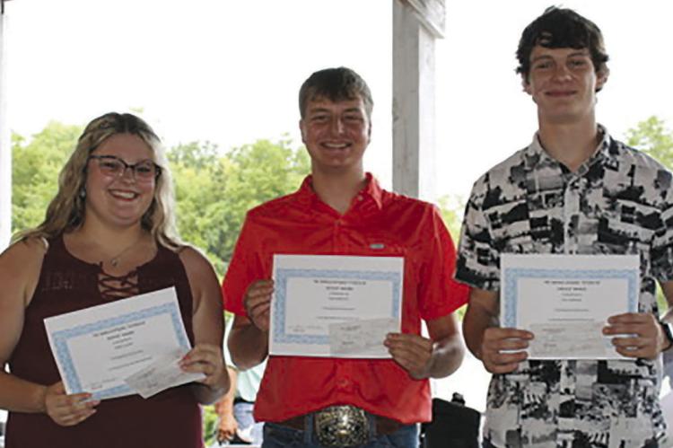 CARSEY CALVERT (from left), Cash Honeycutt and Will Robinson are honored with the Harold Strobel “Citizen of Service” Award. Submitted