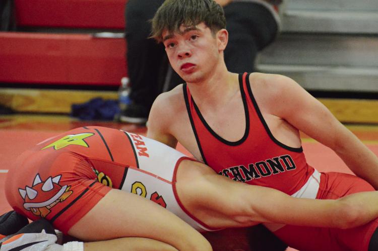 RICHMOND WRESTLER Liam Hyder (right) sprawls as he maintains control of his opponent during a scramble tournament match in Carrollton. At press time, Richmond was slated to host a summer scramble tournament Thursday. SHAWN RONEY | Staff