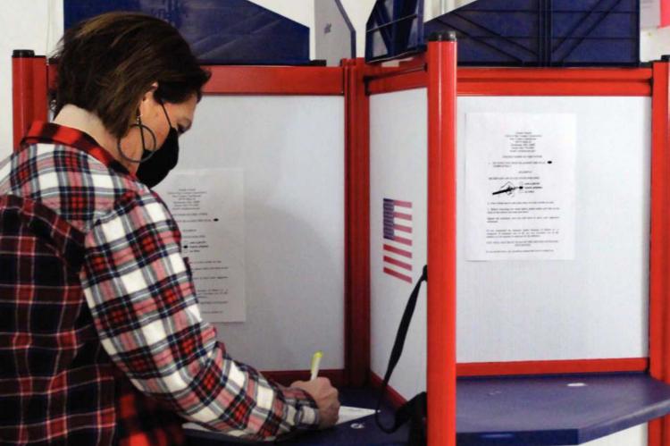 AN EARLY VOTER, Jennifer Siebert, says she will not miss work and she will avoid voting lines. J.C. VENTIMIGLIA | Staff