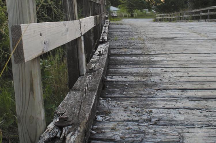 THE BRIDGE ON Myers Road shows signs of deterioration. Plans to replace this bridge are underway. SHARON DONAT | Staff