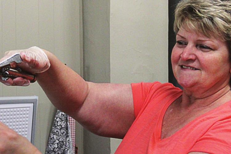 AN ICE CREAM cone comes together in the hands of Renee Kellerman at downtown Richmond’s newest store, Boothe 109.
