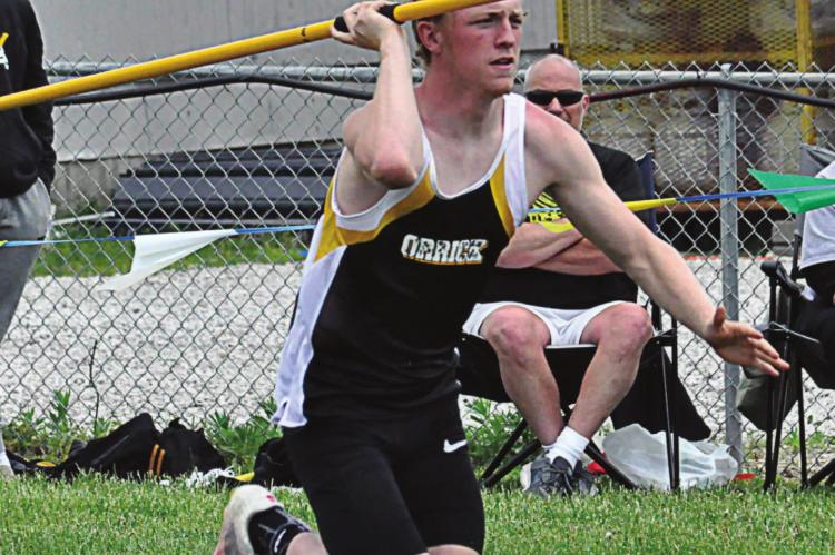 BLAKE BUCHANAN goes into his run to attempt a javelin throw May 8 during Class 1 District 7 competition on the Midway School District campus. SHAWN RONEY | Staff