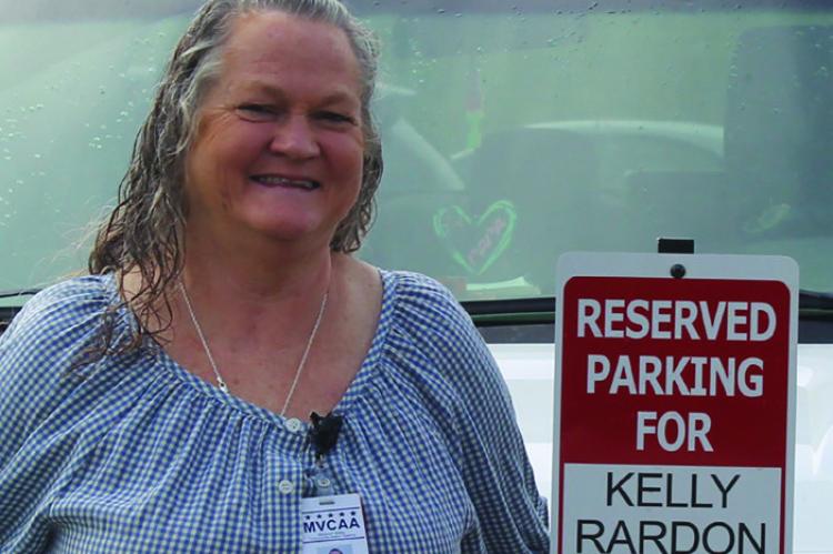 COWORKERS HONOR Kelly Rardon with a reserved parking sign after decades of dedication to the Richmond Head Start Center and the families it serves. SHARON DONAT | Staff