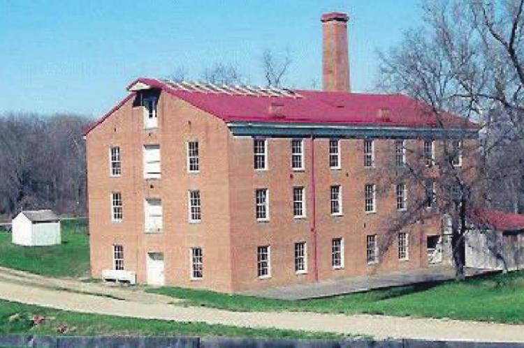 BUILT IN 1860, a year before the start of the Civil War, steam-powered Watkins Mill still contains early textile milling equipment. The park offers several additional buildings, including an eight-sided schoolhouse and a church.