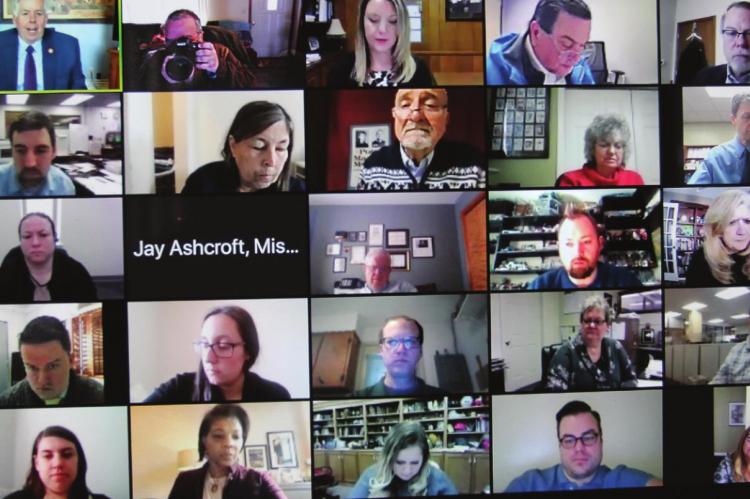 AT TOP LEFT, Gov. Mike Parson meets with Missouri Press Association members via the Zoom social media platform for this year’s Missouri Press Day at the Capitol. Governors meet typically face to face with media members over lunch at the mansion, but the pandemic made that impossible this year. J.C. VENTIMIGLIA | Staff