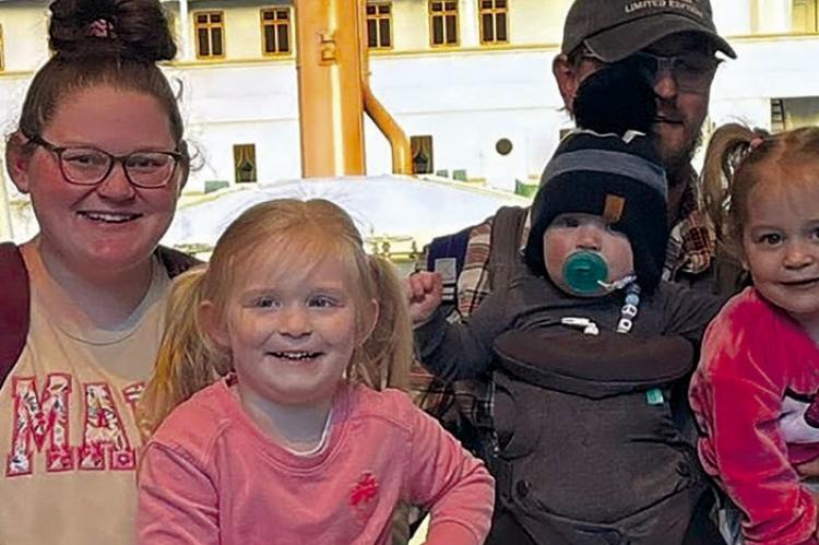 ASHLEE WILLIM-KIRKHAM credits the support of her husband, TJ; and their children, Winnie, Daphnie and Theodore, with helping her along the path to earning her funeral director’s license. Submitted