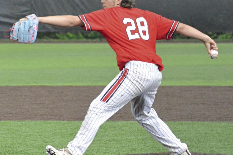STARTER NOAH STEVENS-BREHM strides toward home plate as he delivers a pitch.