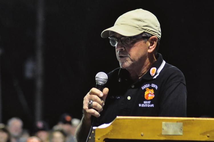 COACHING LEGEND Gary O’Neal takes the microphone and says a few words Sept. 10 at Hardin-Central in recognition of the football stadium there being named after him. SHAWN RONEY | Staff