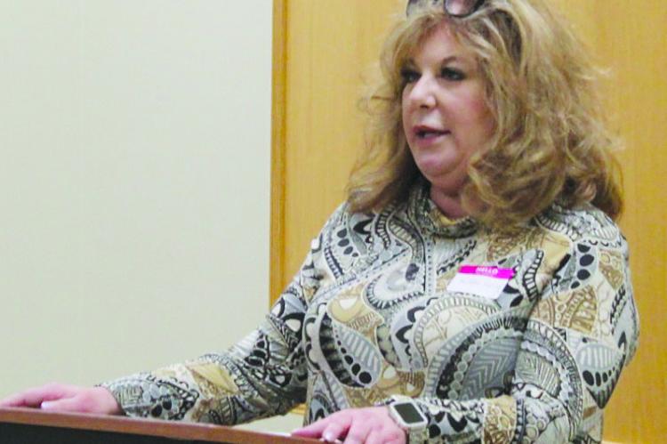 NATALIE MACEY, owner of Macey Bail Bonds, shares her story about becoming a business owner and encourages all attendees to treat others with kindness. MIRANDA JAMISON | Staff