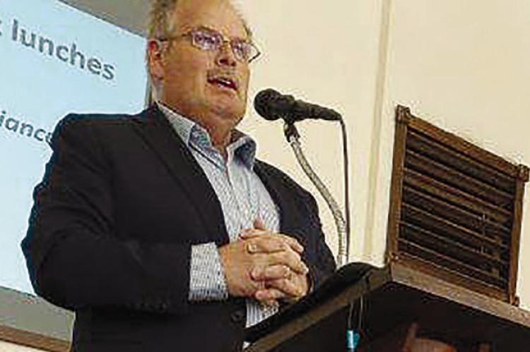 LUNCHEON HOST Willie Isaacson introduces guest speaker Rodney Hyatt. DAVE DONALDSON | Staff