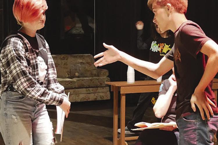 TIMOTHY VAUGHN (left) and Marlie McAdams rehearse for the Richmond High School’s representation of “The Alibis,” a comedic murder mystery play written by Johnathan Dorf. The first showing is today at 7 p.m. inside the Farris Theater in Richmond. The Saturday, Nov. 4 show is 7 p.m. while the Nov. 4 showing is at 2 p.m. SOPHIA BALES | Staff