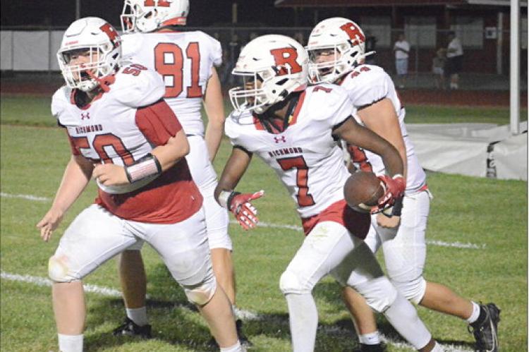 AFTER CATCHING the game-winning TD pass from Jacob Johnson Sept. 8 at Marshall, Chris Webb (No. 7) is joined in an end zone celebration by (from left) John Weber, Tristan McCoy and Dayton Bushong. SHAWN RONEY | Staff