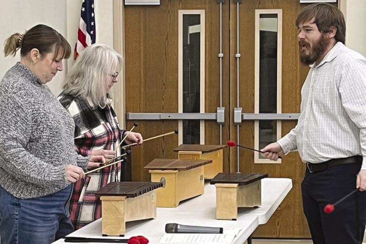 Beta Tau instructed on xylophone