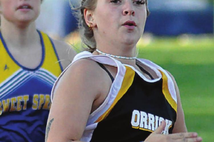 ORRICK SOPHOMORE Kirra Vaughn runs in the girls 200-meter dash April 29 at the Bill Hamann Invitational at Lexington. SHAWN RONEY | Staff