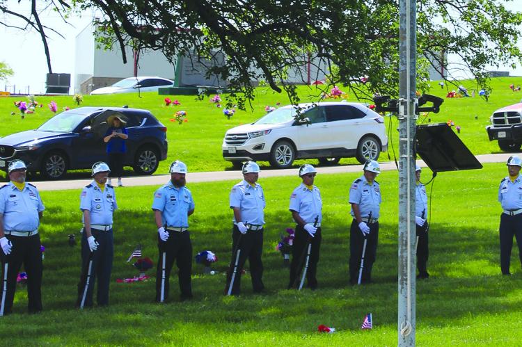 AMERICAN LEGION honor guard prepares for 21-gun salute during the Memorial Day ceremony at Memory Gardens. SHARON DONAT | Staff