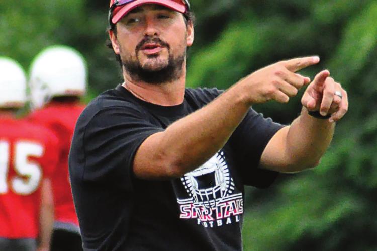 NICK PERSELL, Richmond’s new varsity baseball coach, is putting his diamond duties on hold for a while so he can focus on varsity football. SHAWN RONEY | Staff