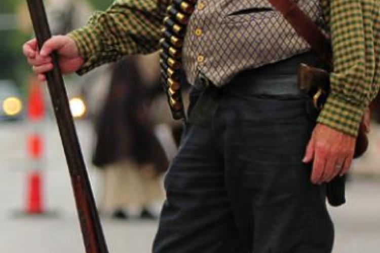 SHOTGUN in hand, Lester Williamson, Odessa, hunts outlaws. Reenactors know history, including what really happens during the Lexington bank robbery and when the military guns down Archie Clement. J.C. VENTIMIGLIA | Staff