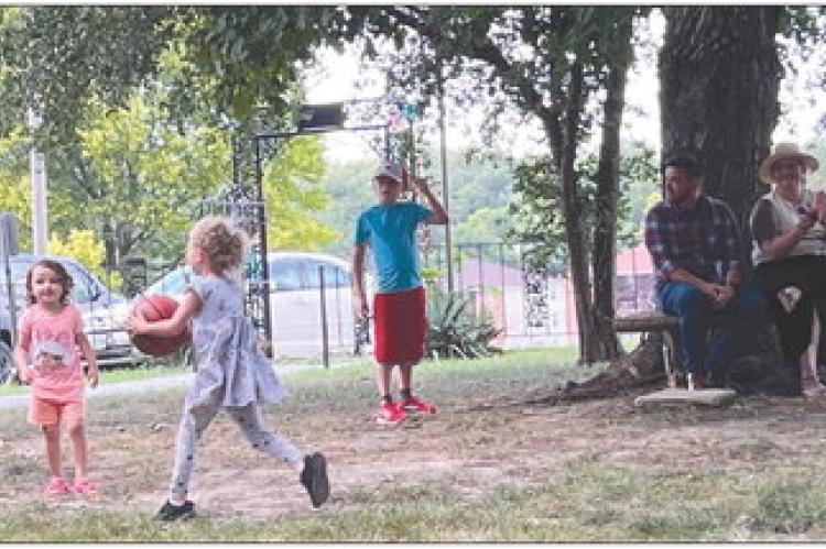 RAY COUNTY youth run around the Ray County Museum courtyard after their sweet treats. CATHY GOTTSCH | Submitted