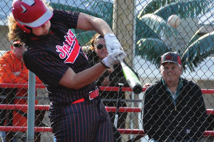JUNIOR Jack Gogue takes a cut at a pitch Monday during the Spartans’ Missouri River Valley Conference East Division loss to Knob Noster at Southview Park in Richmond. SHAWN RONEY | Staff