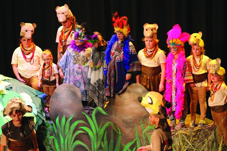 THE ENSEMBLE of youth (photo at left) in animal costumes sing the well-