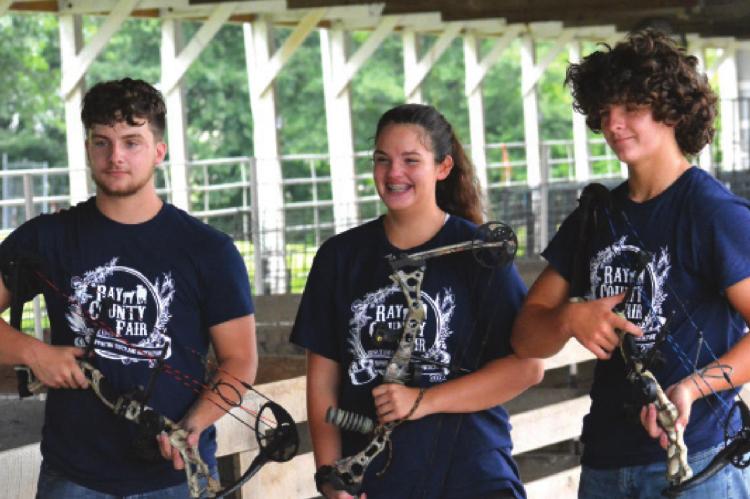 FROM LEFT are archers, and siblings, Blake, Paige and Trent Logsdon. SHAWN RONEY | Staff