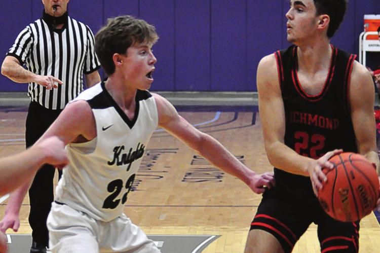 SENIOR WYATT COVEY looks to pass in what turns out to be his final game with Richmond’s varsity boys basketball team, a heartbreaking Class 4 state quarterfinal loss to The Barstow School. SHAWN RONEY | Staff