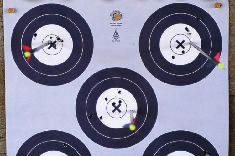 IN THE WHITE: During the archery competition, Dantin McBee, 11, keeps each flight tight in the white. 