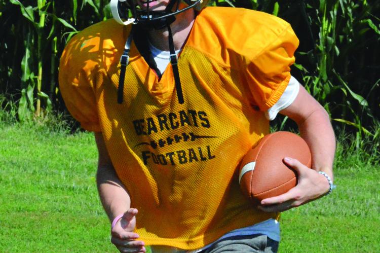 SENIOR JONATHON HARRIS, a Class 1 state-qualifying hurdler in boys track, is looking to use his running ability this fall in 8-man football as he controls Orrick’s rushing-oriented offense at quarterback. SHAWN RONEY | Staff